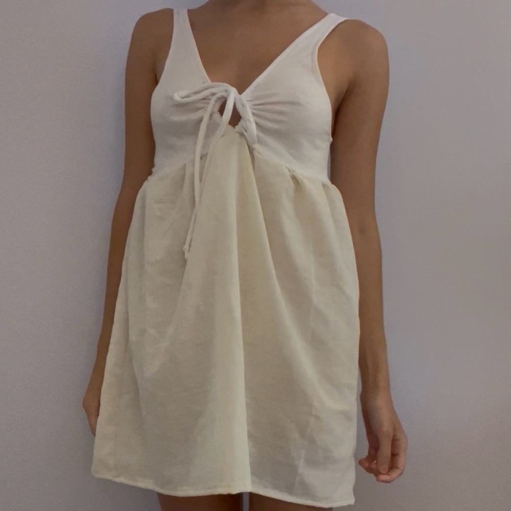 White and cream linen key hole tie babydoll sleeveless mini dress